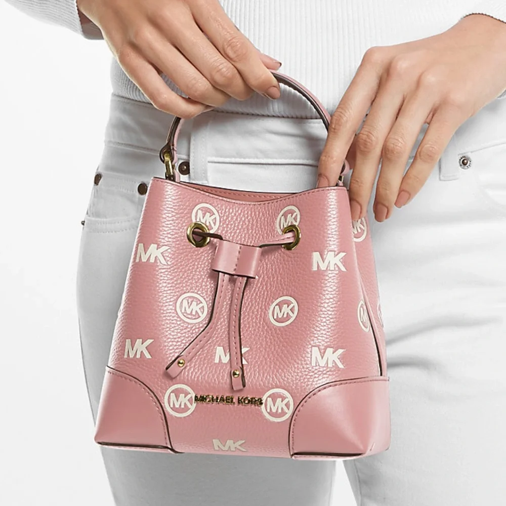 MICHAEL KORS
Mercer Small Logo Embossed Leather Bucket Bag
COLOR PRIMROSE 
NWT - Picture 4 of 4